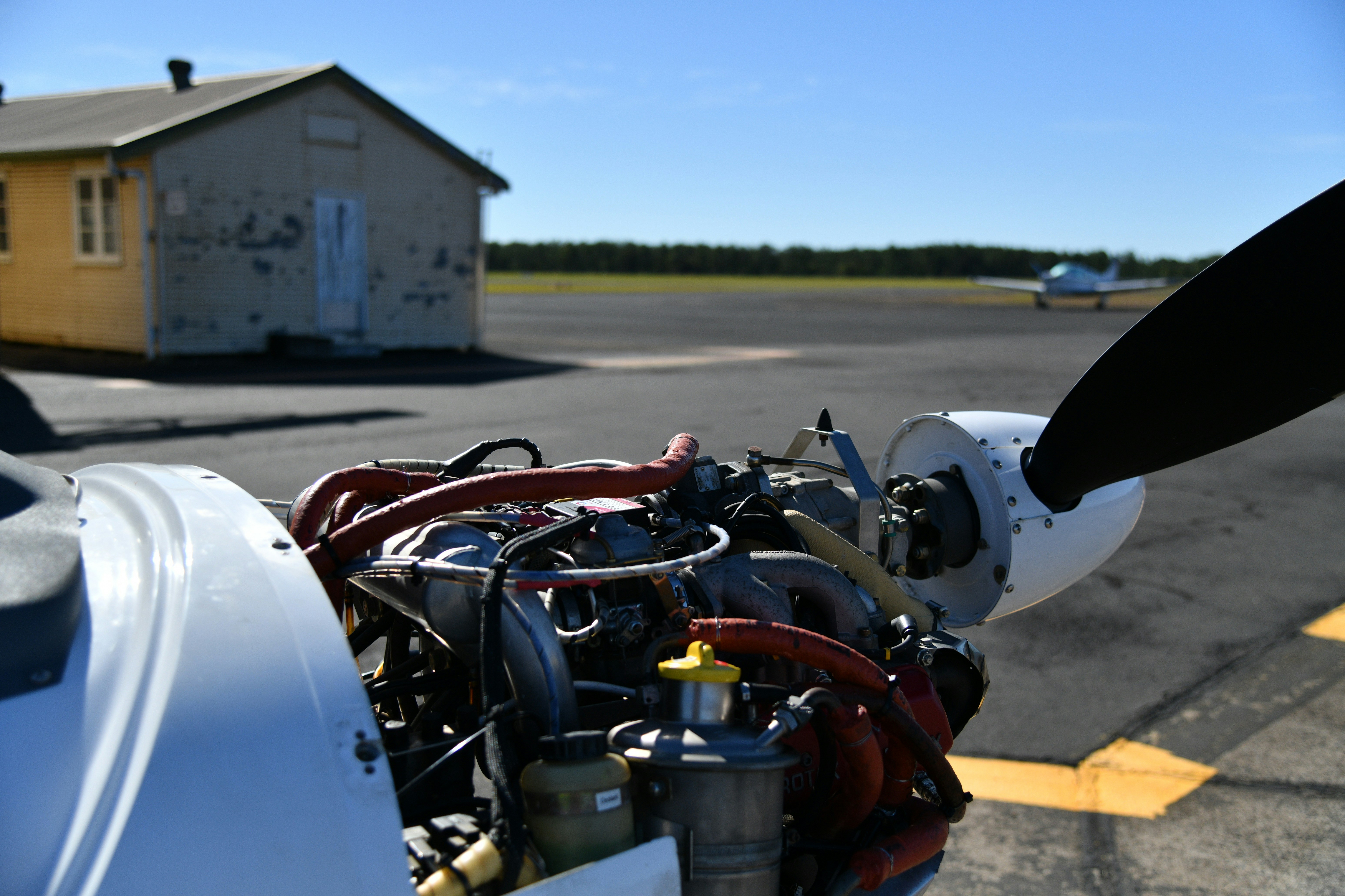Aircraft engine cowling open during an annual inspection maintenance review